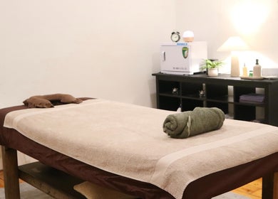 Cozy massage room at Yarraville Massage, Melbourne, Victoria, AU, with a neatly prepared massage table.