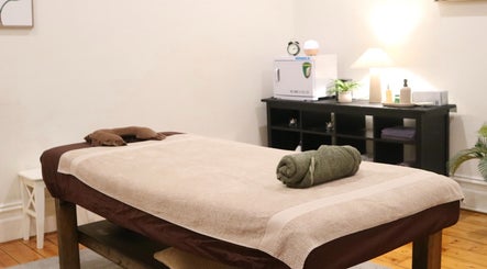 Cozy massage room at Yarraville Massage, Melbourne, Victoria, AU, with a neatly prepared massage table.