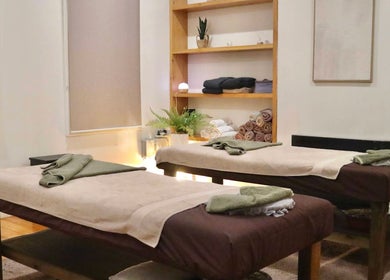Calming Yarraville Massage room with two massage tables in Melbourne, Victoria, AU, promoting relaxation.