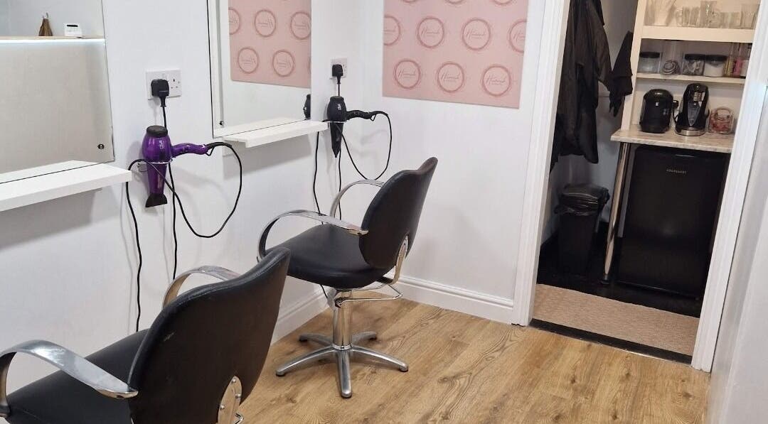 Inviting salon chairs and mirrors at Hannah Hairdressing, Penketh, England, GB.