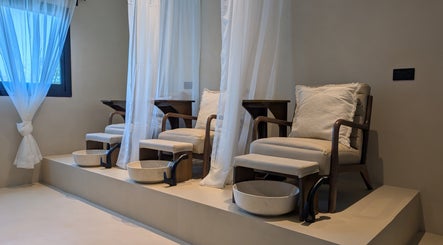 Absa Ladies Beauty Salon pedicure area with plush chairs and basins, Dubai, Dubai, AE.