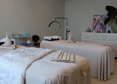 Relaxing massage room at Absa Ladies Beauty Salon in Dubai, Dubai, AE, with elegant decor and cozy beds.