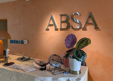 Reception area at Absa Ladies Beauty Salon, Dubai with modern decor and cozy ambiance.