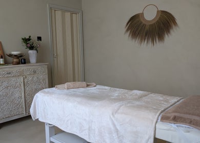 Elegant treatment room at Absa Ladies Beauty Salon, Dubai, Dubai, AE, featuring calming decor and massage bed.