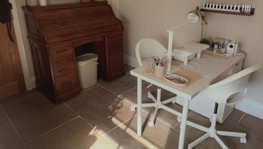 Cozy beauty station at The Snug Room, Ravenfield, England, GB with vintage desk and modern manicure table.