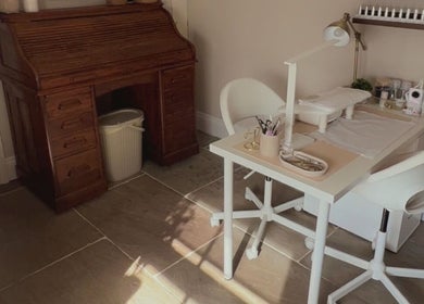 Cozy beauty station at The Snug Room, Ravenfield, England, GB with vintage desk and modern manicure table.