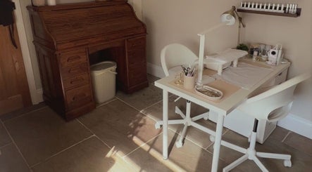 Cozy beauty station at The Snug Room, Ravenfield, England, GB with vintage desk and modern manicure table.