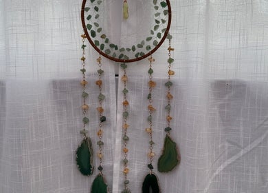Gemstone dreamcatcher at Mia Wellness Room, Penryn, England, GB, enhancing serene ambiance with decor.
