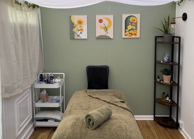 Mia Wellness Room in Penryn, England, GB featuring a serene massage area with calming decor.