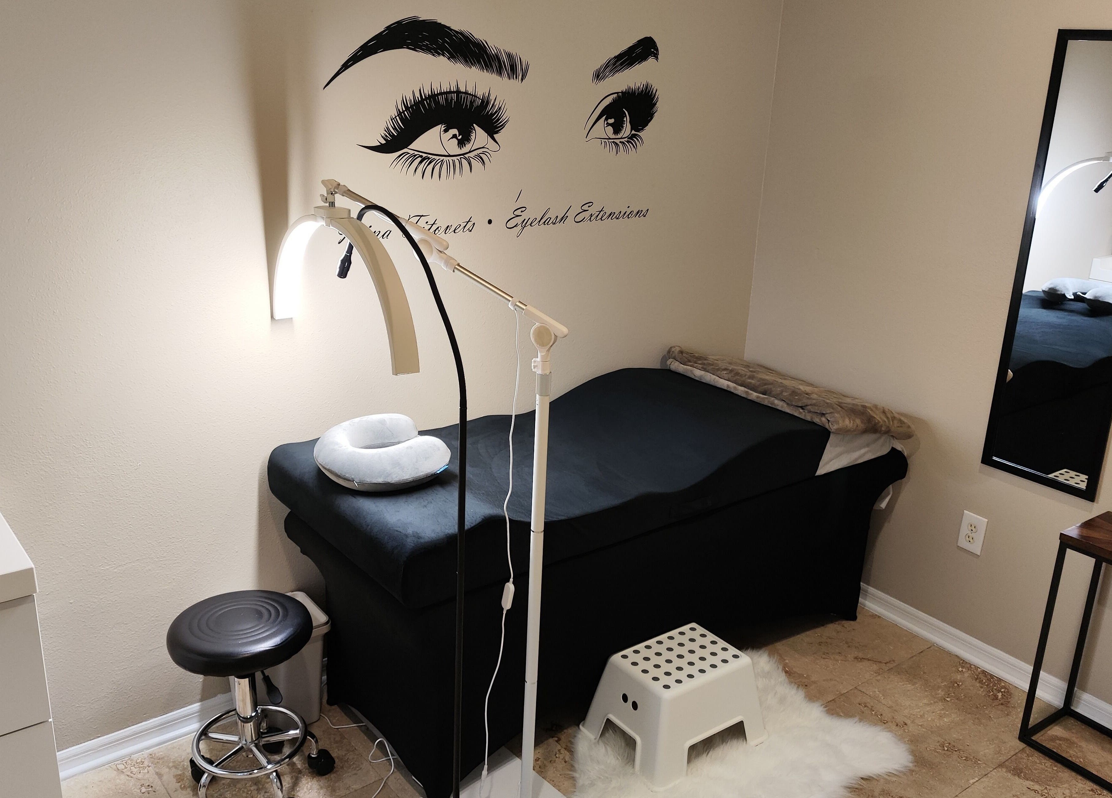 Irina Titovets • Eyelash Extensions treatment room in Lutz, Florida, US with a calm, professional ambiance.