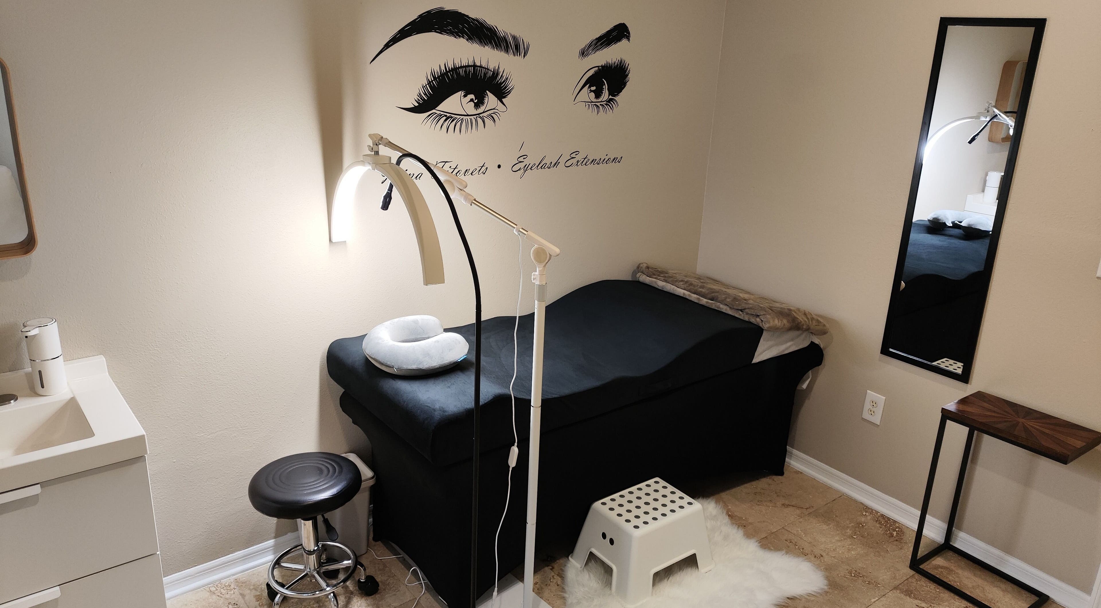 Irina Titovets • Eyelash Extensions treatment room in Lutz, Florida, US with a calm, professional ambiance.