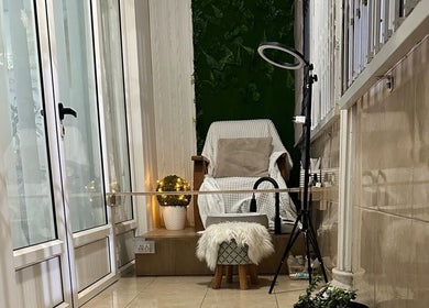 Relaxing seating area at Gorgeous Nail Bar & Lashes in Port Louis District, MU, featuring a plush chair and ambient lighting.