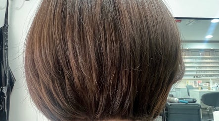 Chic brown bob hairstyle at D_A hair Design in London, England, GB salon setting.