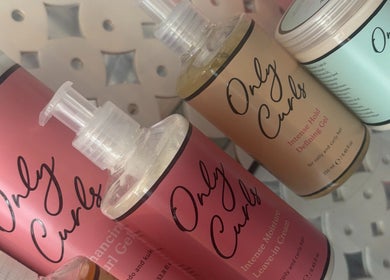 Curl-enhancing products at The Hair And Beauty Corner, Manchester, England, GB for luscious locks.