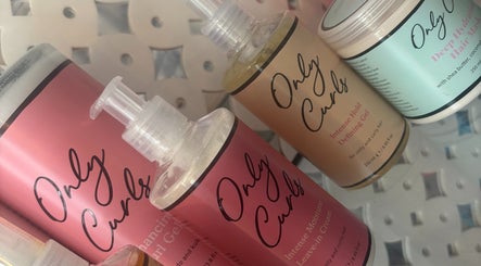 Curl-enhancing products at The Hair And Beauty Corner, Manchester, England, GB for luscious locks.
