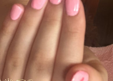 Manicure with pink nails at Cece Mol Beauty, York, England, GB. Perfect for stylish and trendy nail care.