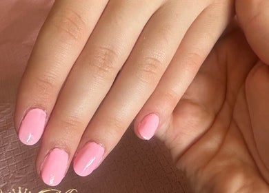 Manicured hands with pink nails at Cece Mol Beauty, York, England, GB.