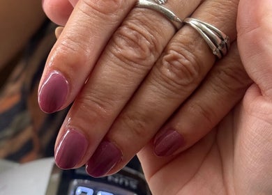 Manicure with glossy pink nails at Cece Mol Beauty, York, England, GB.