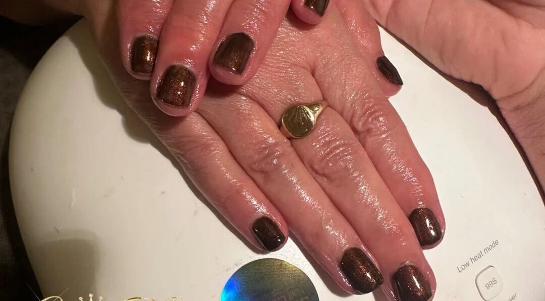 Beautiful brown manicured nails at Cece Mol Beauty, York, England, GB, showcasing elegant nail art.