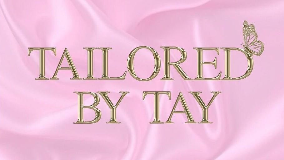 Tailored By Tay logo with butterfly detail on pink backdrop at You’re Lit Clinic, Snodland, England, GB.