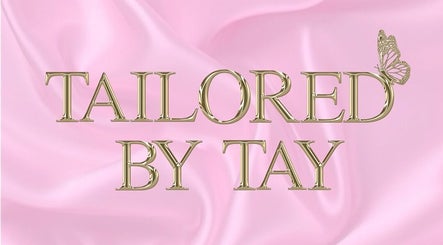 Tailored By Tay logo with butterfly detail on pink backdrop at You’re Lit Clinic, Snodland, England, GB.