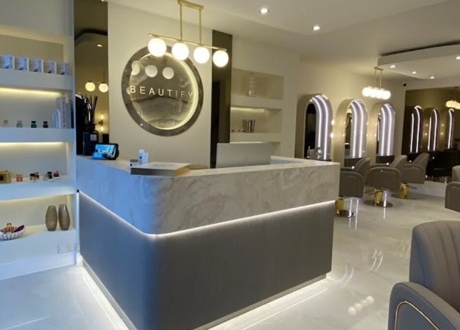 Modern reception at Hair with Geo, Clayton-le-woods, England, GB showcasing elegant interior design.