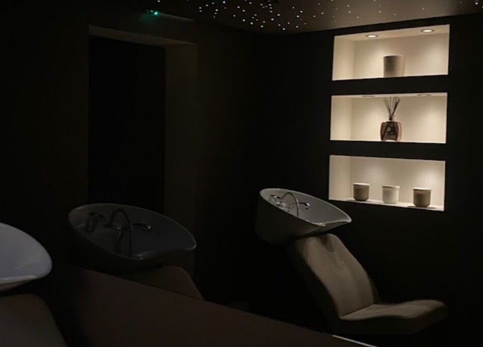 Elegant shampoo stations in serene lighting at Hair with Geo, Clayton-le-woods, England, GB.