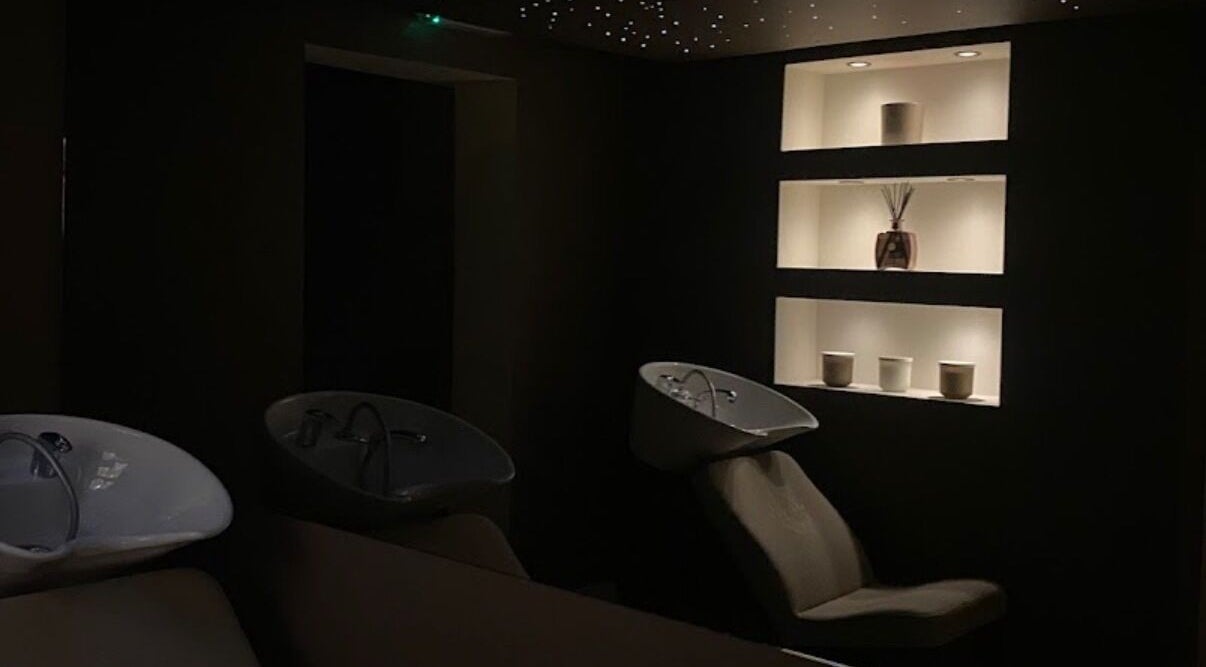 Elegant shampoo stations in serene lighting at Hair with Geo, Clayton-le-woods, England, GB.