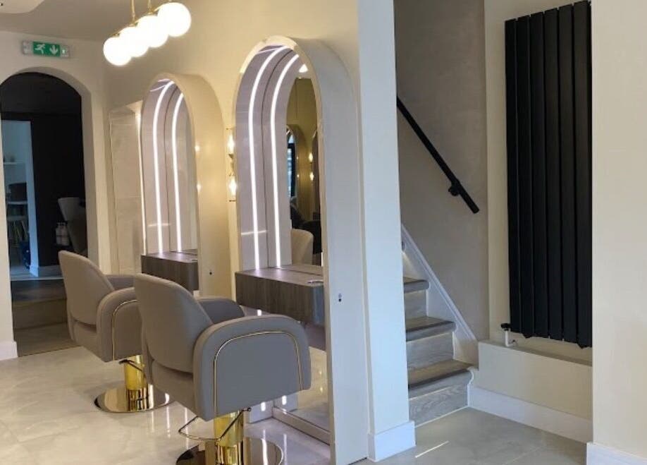 Chic salon at Hair with Geo in Clayton-le-woods, England, GB with modern styling chairs and mirrors.