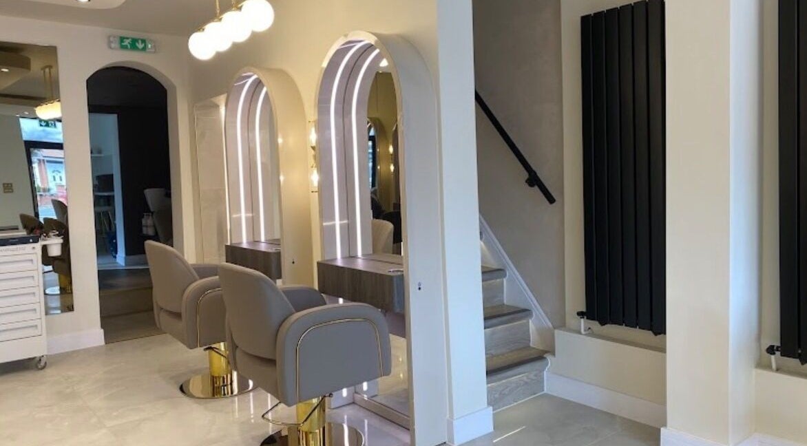 Chic salon at Hair with Geo in Clayton-le-woods, England, GB with modern styling chairs and mirrors.