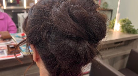 Elegant updo hairstyle at Hair with Muireann, Ovens, County Cork, IE, showcasing chic salon style.