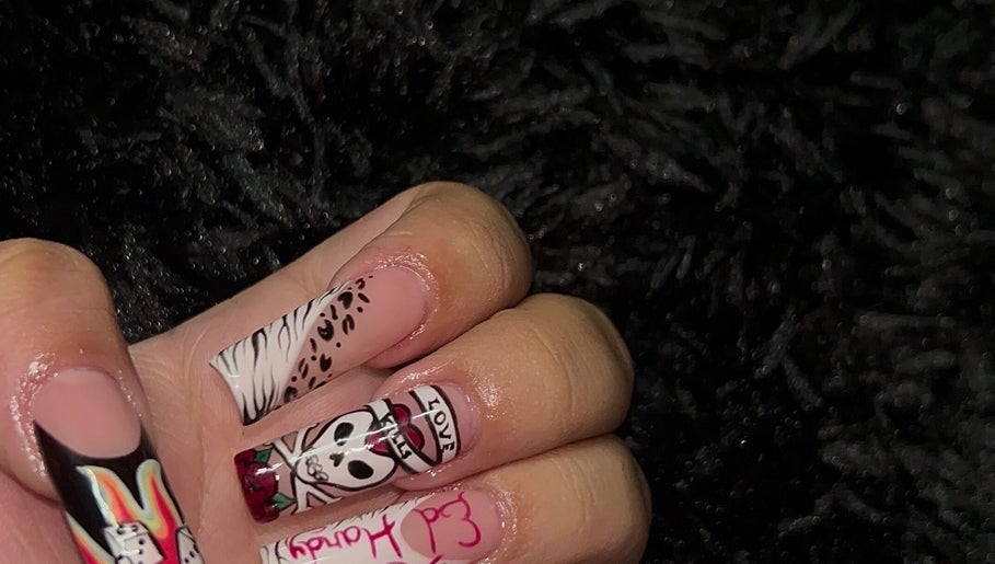 Unique nail art with skull and leopard prints at Polished by Meg, Country Club, Florida, US.