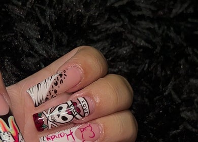 Unique nail art with skull and leopard prints at Polished by Meg, Country Club, Florida, US.