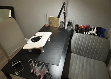 Nail treatment setup at Polished by Meg, Country Club, Florida, US. Cozy ambiance for beauty care.