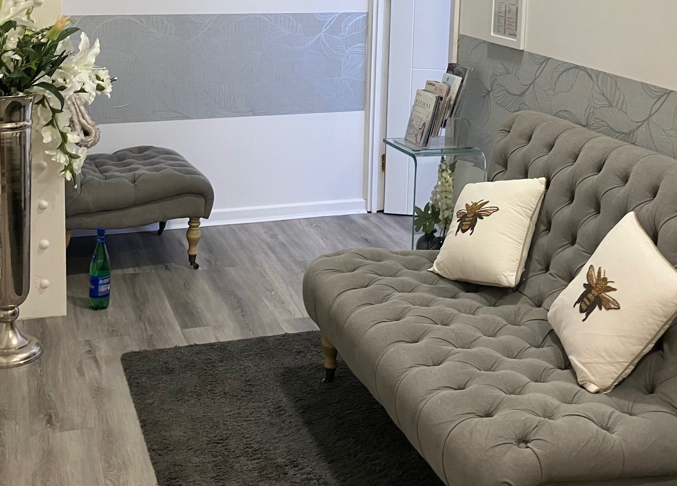 Chic lounge area at Anja Gosha, Cardiff, Wales with elegant decor and plush seating.