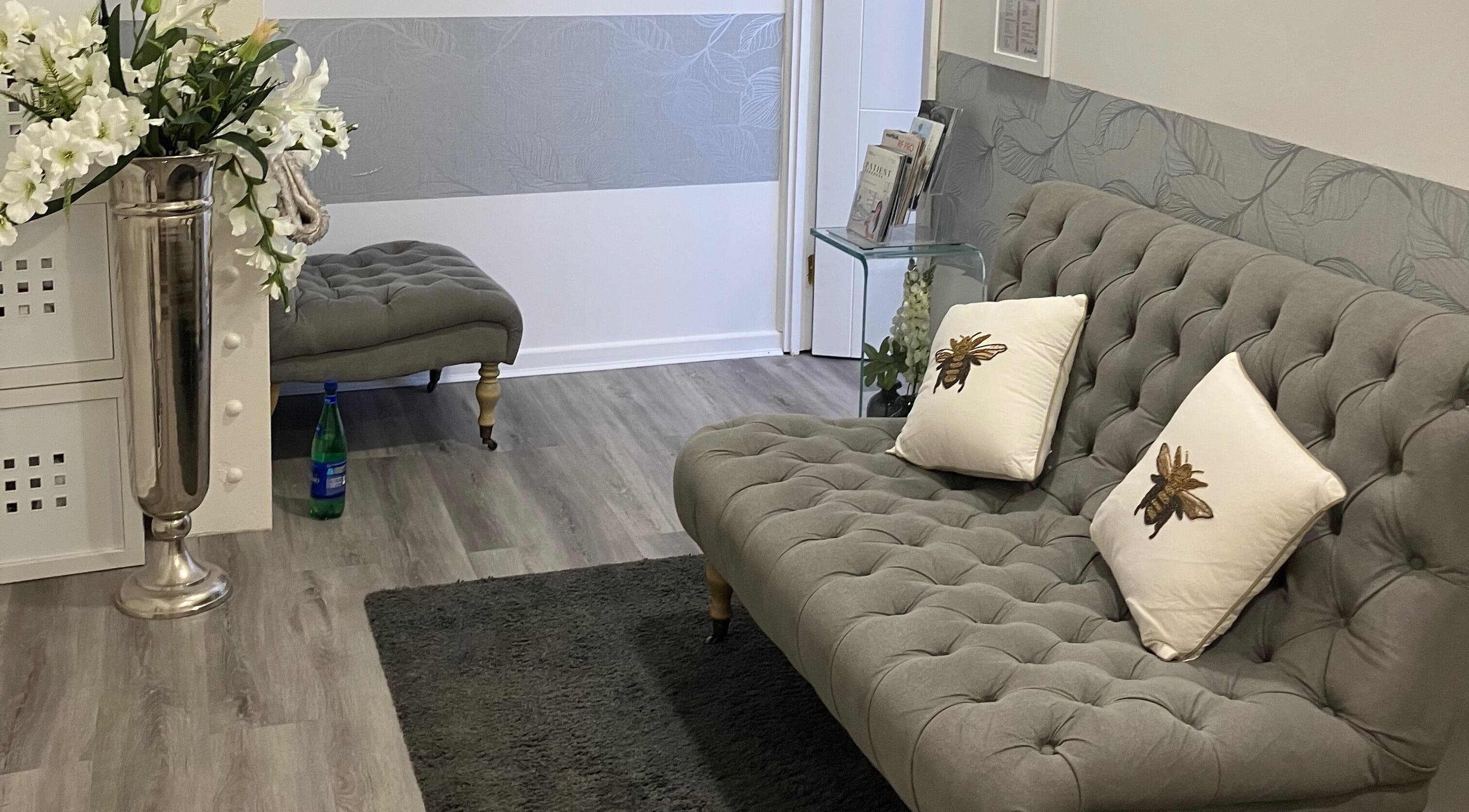 Chic lounge area at Anja Gosha, Cardiff, Wales with elegant decor and plush seating.