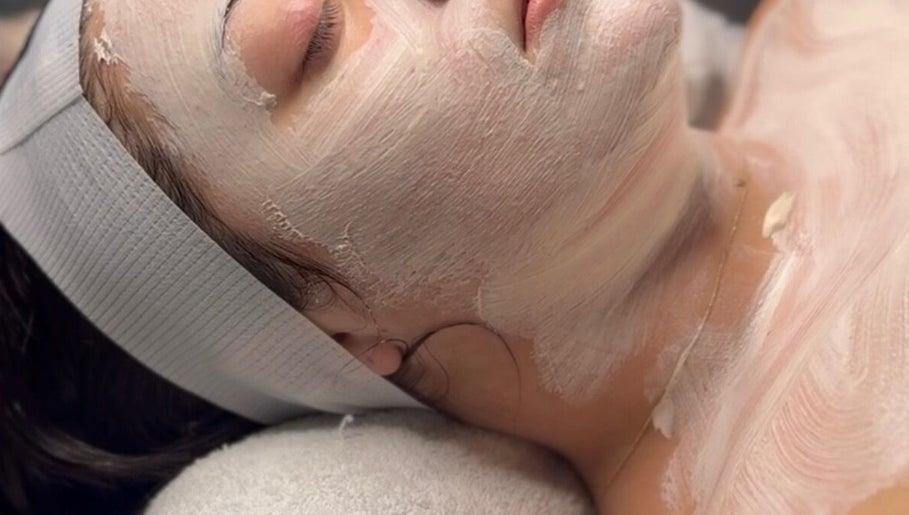 Facial treatment at Your Skin Bar, Melbourne, Victoria, AU. Woman's face covered in a rejuvenating mask.