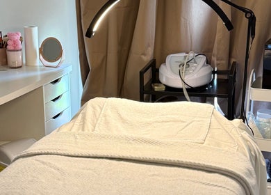 A serene treatment room at Your Skin Bar, Melbourne, Victoria, AU showcasing a cozy, inviting aesthetic.