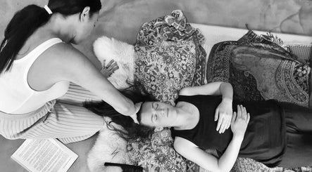 Rejuvenating session at Leah Patara Birth Doula, Red Hill, Victoria, AU. Doula assists a calm client.