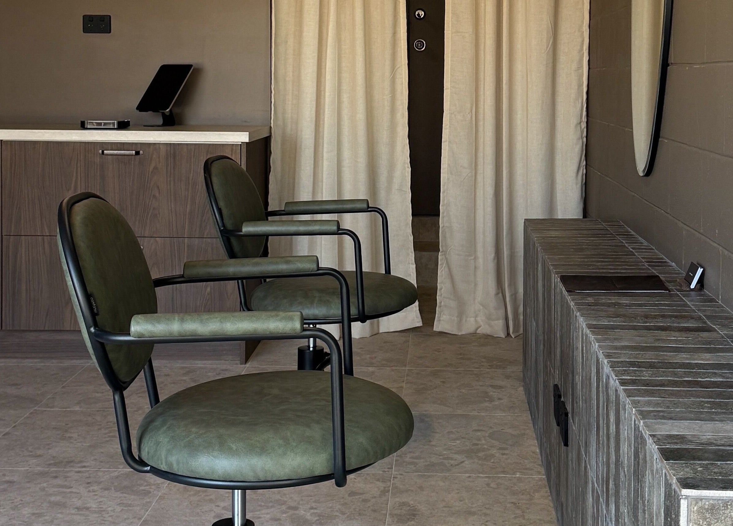Elegant salon chairs and mirrors at Atelier Annelise in Port Kembla, New South Wales, AU.