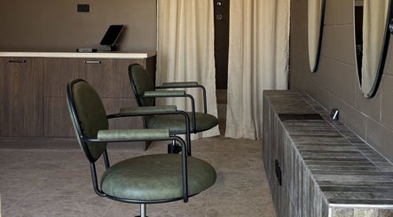 Elegant salon chairs and mirrors at Atelier Annelise in Port Kembla, New South Wales, AU.