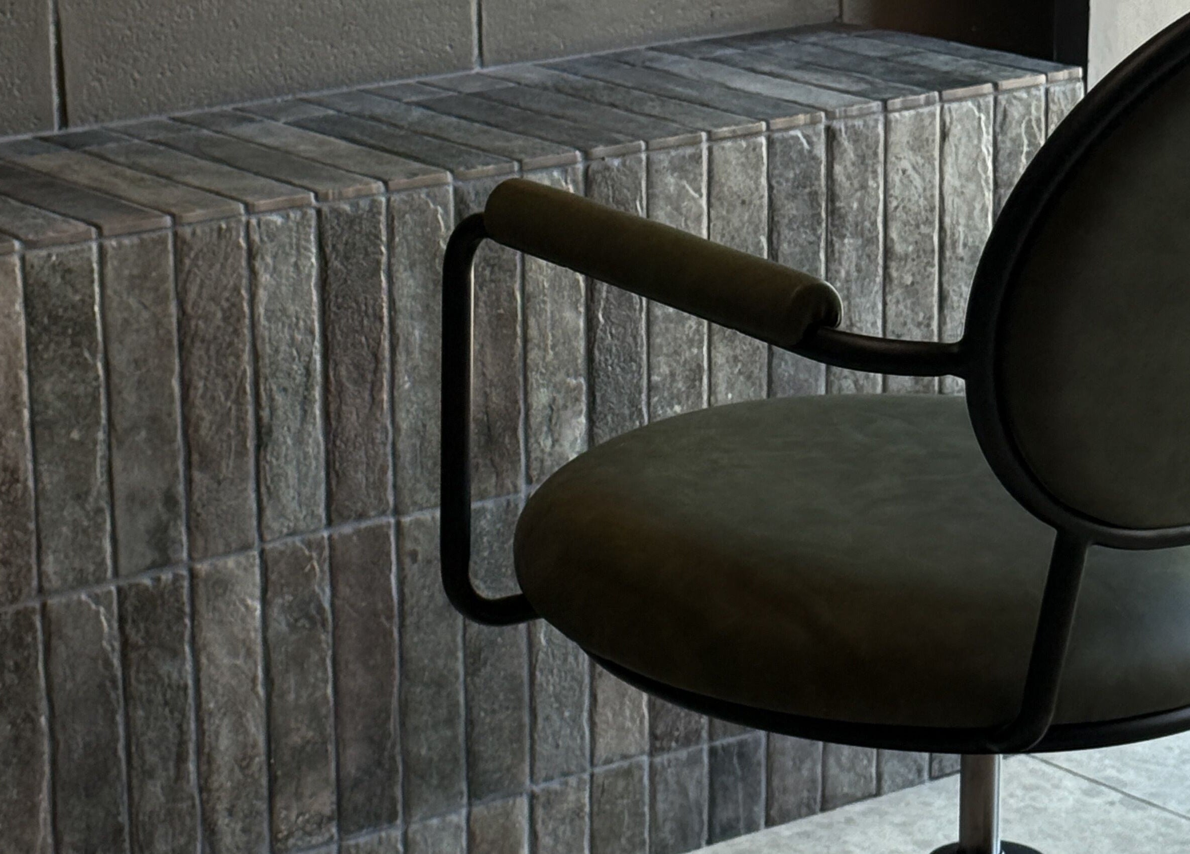 Modern salon chair at Atelier Annelise, Port Kembla, New South Wales, AU, highlighting style and comfort.