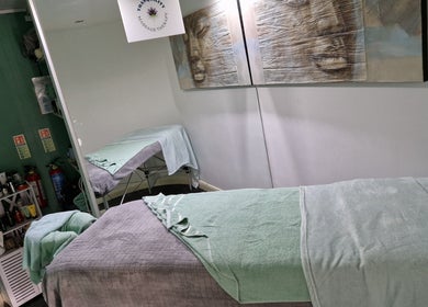 Calm massage room at Tranquility Massage Therapy, La, England, GB, featuring soothing decor and treatment table.