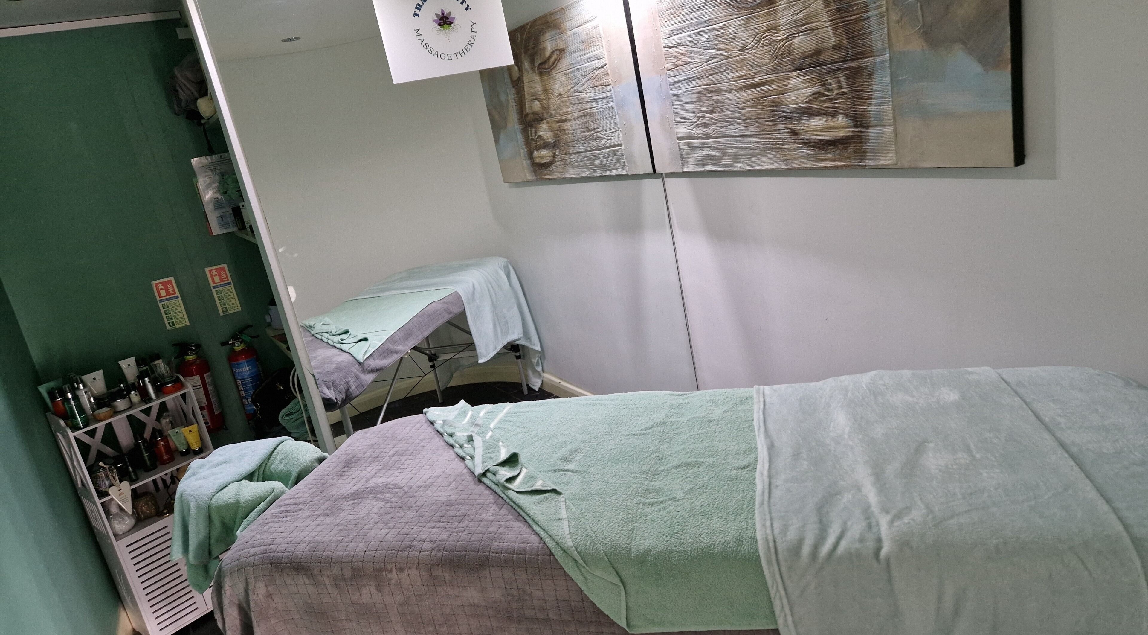 Calm massage room at Tranquility Massage Therapy, La, England, GB, featuring soothing decor and treatment table.
