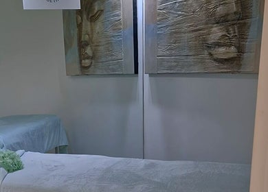Tranquility Massage Therapy room in La, England, GB with calming decor and massage beds.