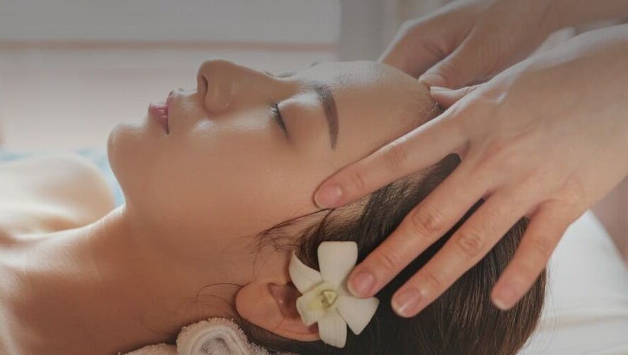 Relaxing head massage at Seven Cures, Riyadh, Riyadh Province, SA, with a floral touch of elegance.