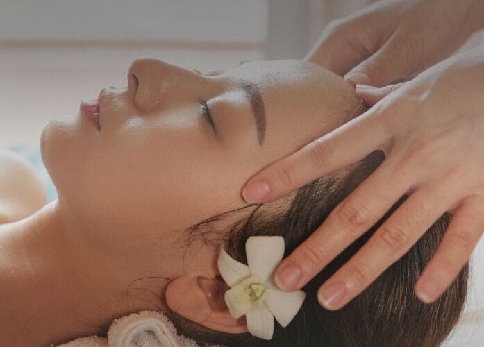 Relaxing head massage at Seven Cures, Riyadh, Riyadh Province, SA, with a floral touch of elegance.