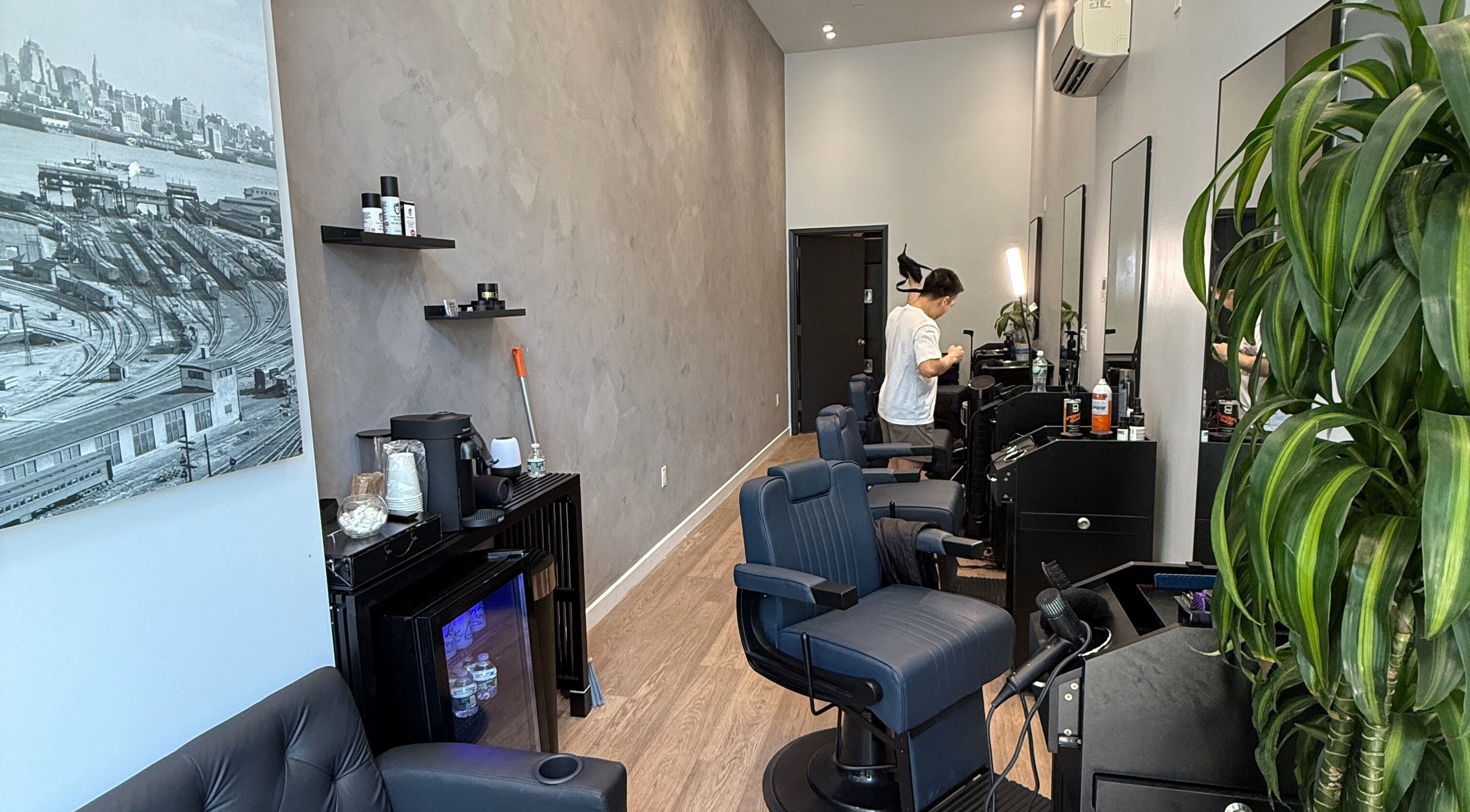 Modern interior of SAVANT Williamsburg beauty salon in New York, New York, US, showcasing service station.