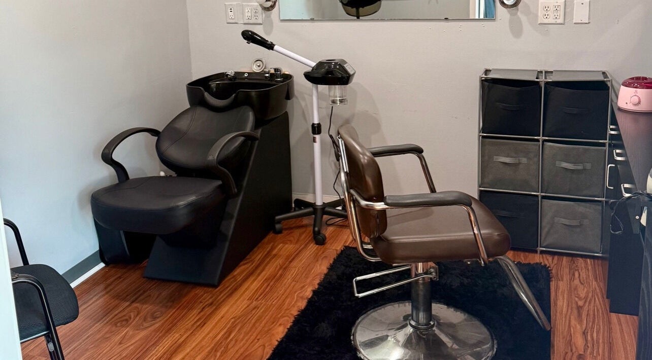 Modern styling chair with equipment at E Nicole Hair Bar, Jeanerette, Louisiana, US.