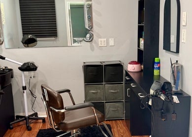 E Nicole Hair Bar in Jeanerette, Louisiana, features stylish salon setup with tools for perfect hair care.